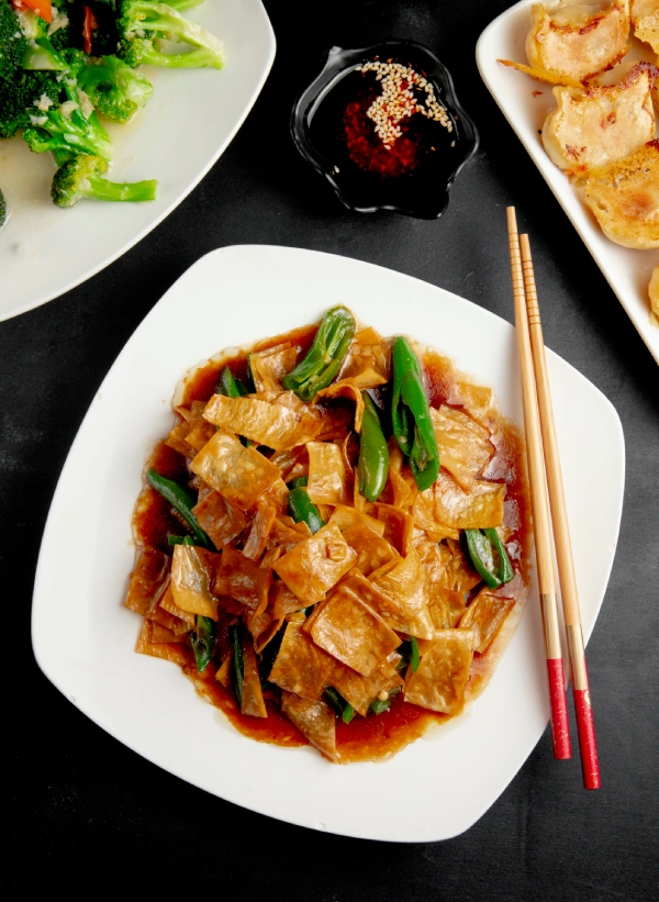 fried-green-bean-with-chili-pepper-black-table